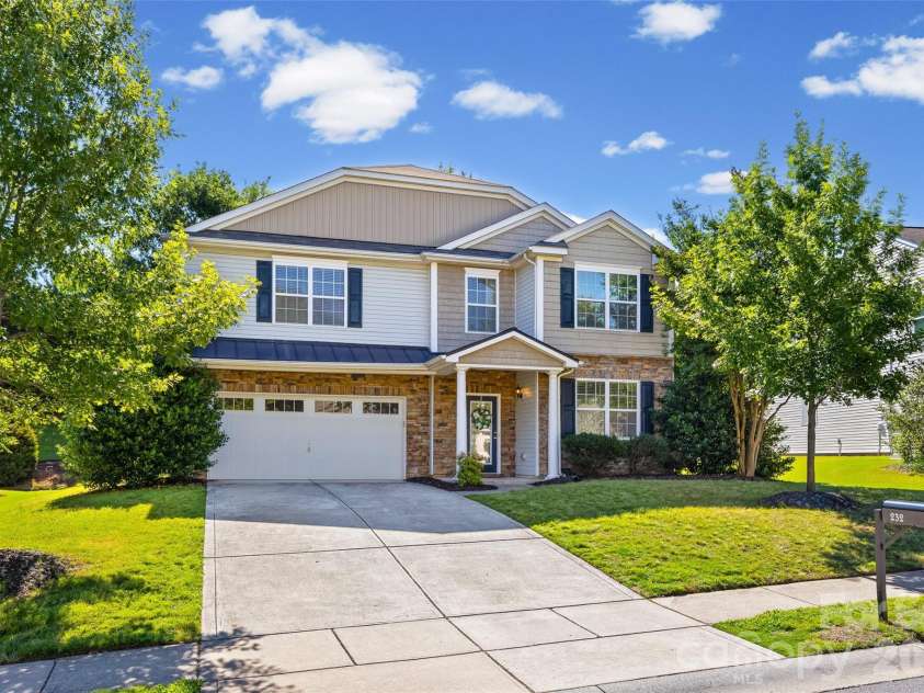 232 Sycamore Creek Road, Fort Mill, SC 29708.  MLS# CAR4385566, YatesRealty ID 29042. Beautiful curb appeal and a long driveway create the perfect first impression.