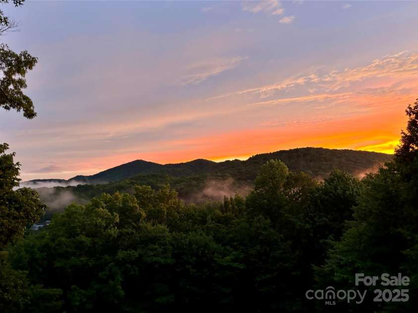 620 Glenview Road, Newland, NC 28657.  MLS# CAR4332877, YatesRealty ID 29044. Sunset from deck