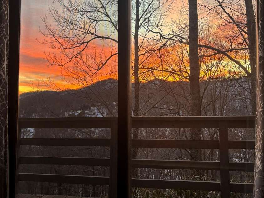 620 Glenview Road, Newland, NC 28657.  MLS# CAR4332877, YatesRealty ID 29044. Sunset from Primary Bedroom