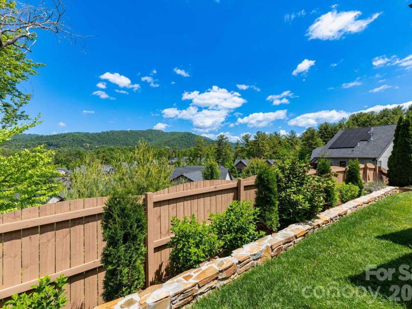 407 Bell Lily Drive, Weaverville, NC 28787.  MLS# CAR4379764, YatesRealty ID 29045. Views from Back Yard