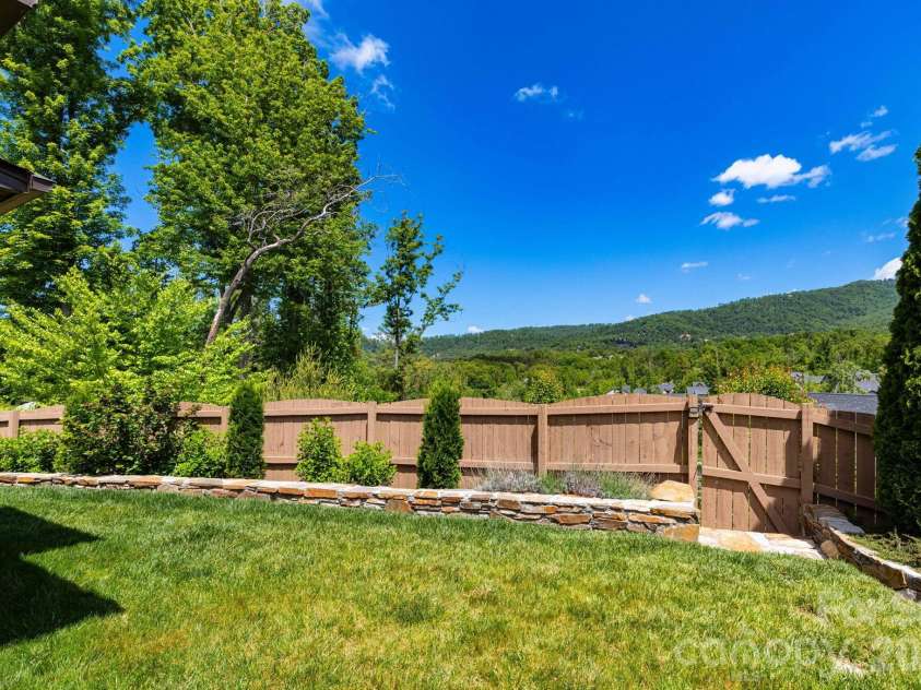 407 Bell Lily Drive, Weaverville, NC 28787.  MLS# CAR4379764, YatesRealty ID 29045. Views from Back Yard