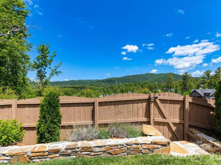 407 Bell Lily Drive, Weaverville, NC 28787.  MLS# CAR4379764, YatesRealty ID 29045. Views from Back Yard
