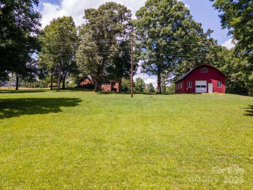 5567 Quail Creek Drive, Granite Falls, NC 28630.  MLS# CAR4286609, YatesRealty ID 29045. 