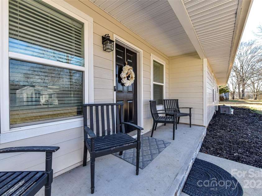 1511 Liberty Avenue, Albemarle, NC 28001.  MLS# CAR4222162, YatesRealty ID 2906. Rocking Chair Front Porch