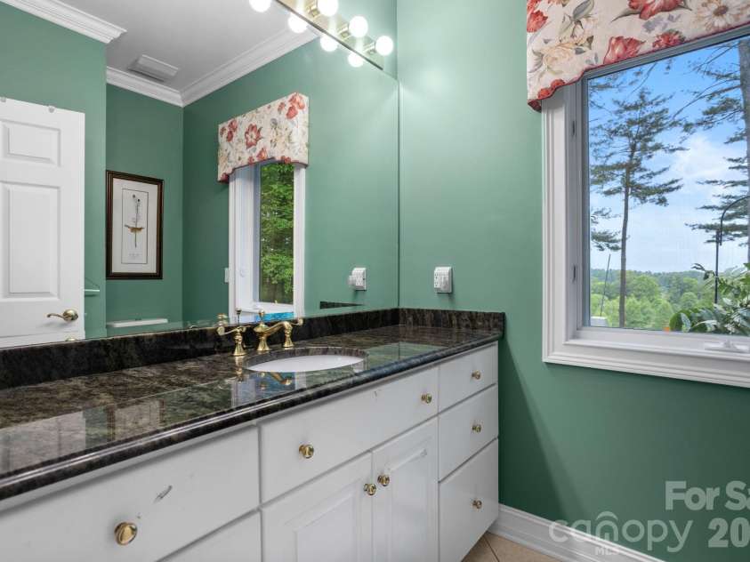 209 Pineholt Lane, Flat Rock, NC 28731.  MLS# CAR4387612, YatesRealty ID 29060. 