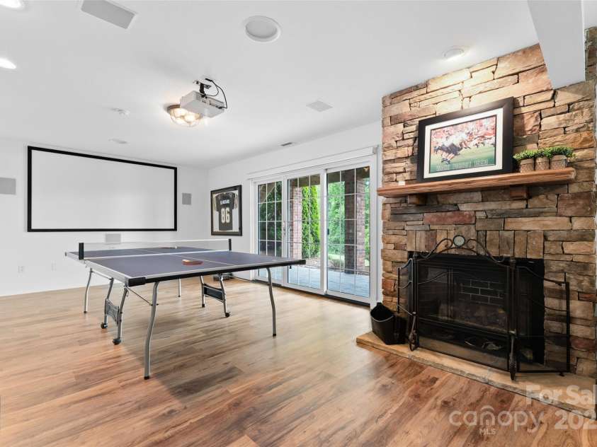 230 Fairway Falls Road, Mills River, NC 28759.  MLS# CAR4256641, YatesRealty ID 29061. Basement HLA with Gas Log Fireplace