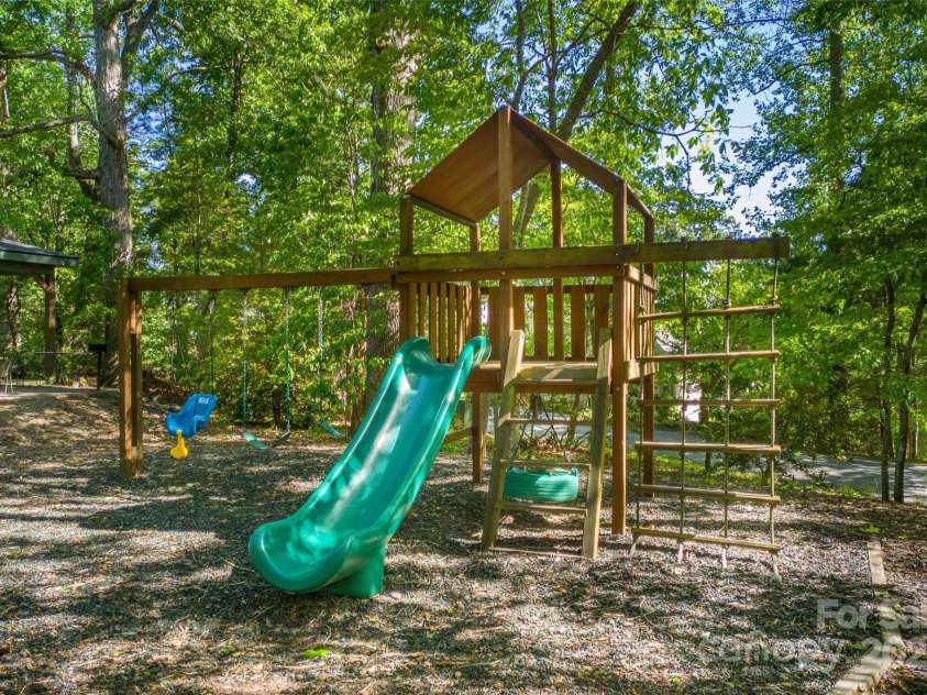 230 Fairway Falls Road, Mills River, NC 28759.  MLS# CAR4256641, YatesRealty ID 29061. Community Playground
