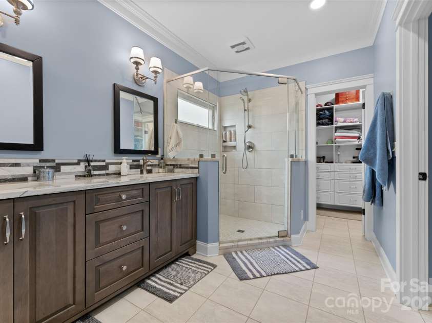 230 Fairway Falls Road, Mills River, NC 28759.  MLS# CAR4256641, YatesRealty ID 29061. Dual sinks & vanity, granite counters, tile floors