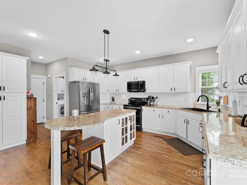 230 Fairway Falls Road, Mills River, NC 28759.  MLS# CAR4256641, YatesRealty ID 29061. Gourmet Kitchen with Stainless Steel Appliances and a Sprawling Island