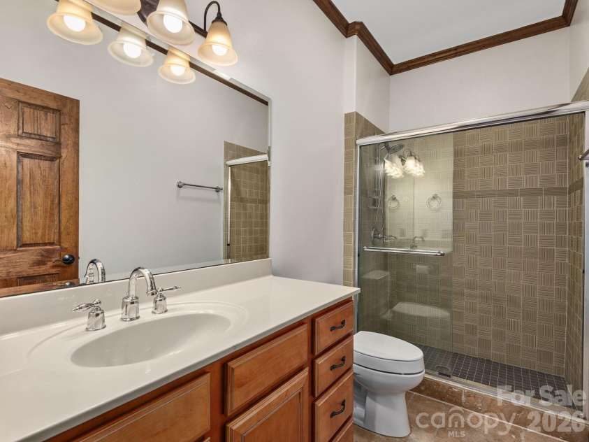 248 Wisdom Cove Road, Flat Rock, NC 28731.  MLS# CAR4357941, YatesRealty ID 29067. Basement Full Bathroom.