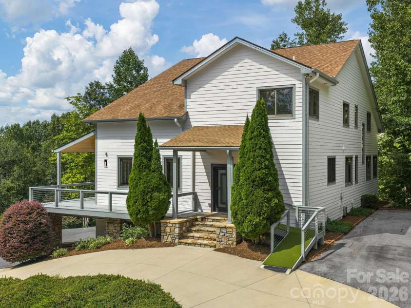 248 Wisdom Cove Road, Flat Rock, NC 28731.  MLS# CAR4357941, YatesRealty ID 29067. Main Level Entry w/additional ramp access. Main Level parking for several vehicles.