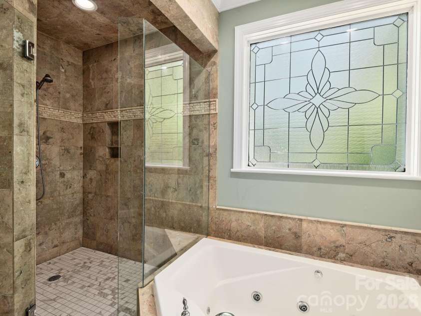 248 Wisdom Cove Road, Flat Rock, NC 28731.  MLS# CAR4357941, YatesRealty ID 29067. Primary separate shower.