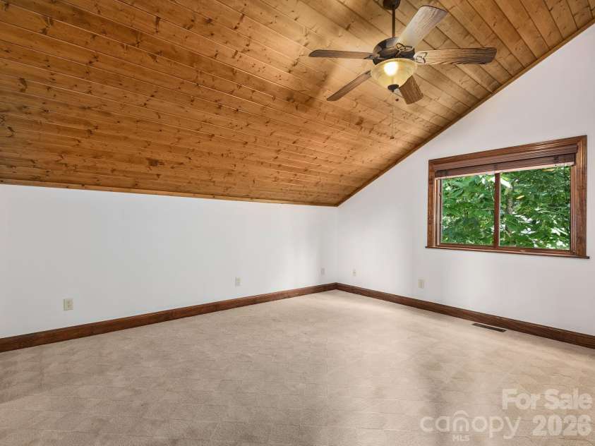 248 Wisdom Cove Road, Flat Rock, NC 28731.  MLS# CAR4357941, YatesRealty ID 29067. Upper Level second primary bedroom w/attached ensuite.
