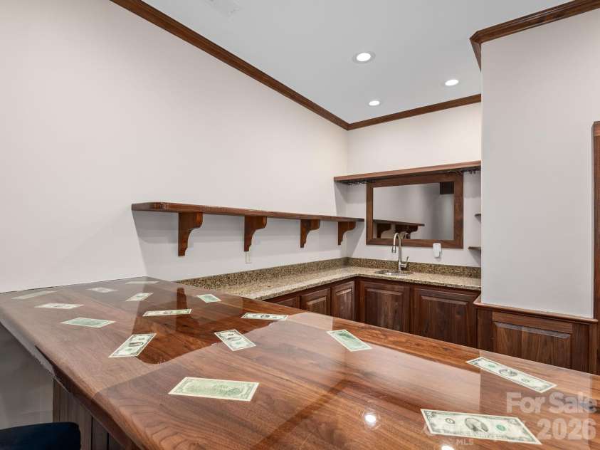 248 Wisdom Cove Road, Flat Rock, NC 28731.  MLS# CAR4413753, YatesRealty ID 29067. Full Entertaining Bar and sink.