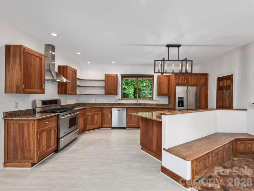 248 Wisdom Cove Road, Flat Rock, NC 28731.  MLS# CAR4413753, YatesRealty ID 29067. Open Kitchen to Great Room. Foyer, Bench w/storage.