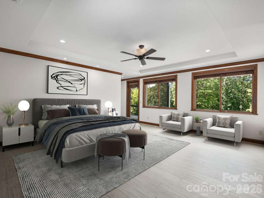 248 Wisdom Cove Road, Flat Rock, NC 28731.  MLS# CAR4413753, YatesRealty ID 29067. Primary Bedroom on Main Level. Access to Screen Porch. Virtually staged.