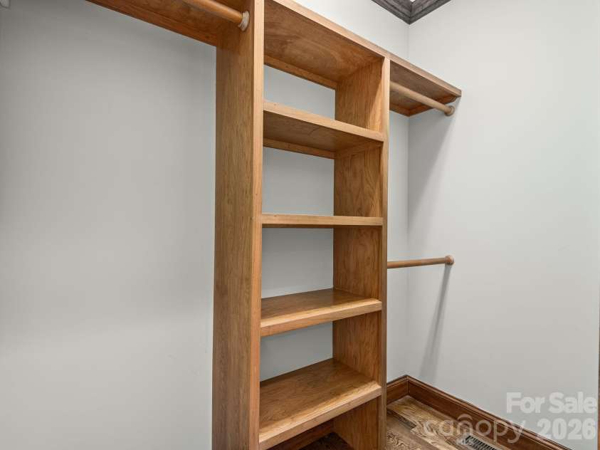 248 Wisdom Cove Road, Flat Rock, NC 28731.  MLS# CAR4413753, YatesRealty ID 29067. Two Primary Closets w/built-ins.