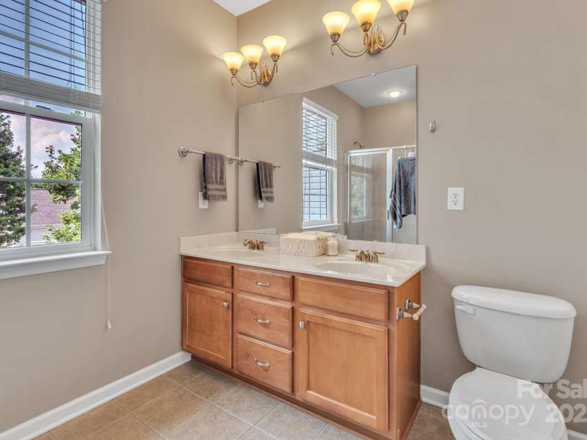 10121 Halkirk Manor Lane, Charlotte, NC 28278.  MLS# CAR4277105, YatesRealty ID 29068. Dual vanities for your convenience