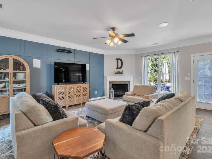 10121 Halkirk Manor Lane, Charlotte, NC 28278.  MLS# CAR4277105, YatesRealty ID 29068. Living room includes surround sound system