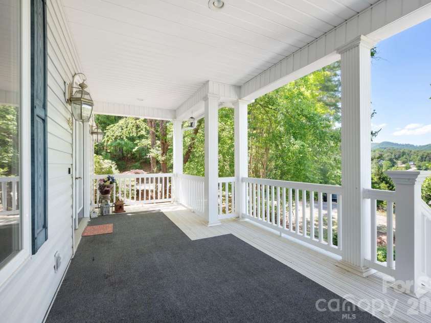 43 Charles Marlowe Drive, Fairview, NC 28730.  MLS# CAR4385183, YatesRealty ID 29070. Covered front porch living!