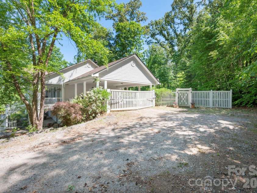 43 Charles Marlowe Drive, Fairview, NC 28730.  MLS# CAR4385183, YatesRealty ID 29070. Drive up, park in the covered carport, walk right in to the main level living...