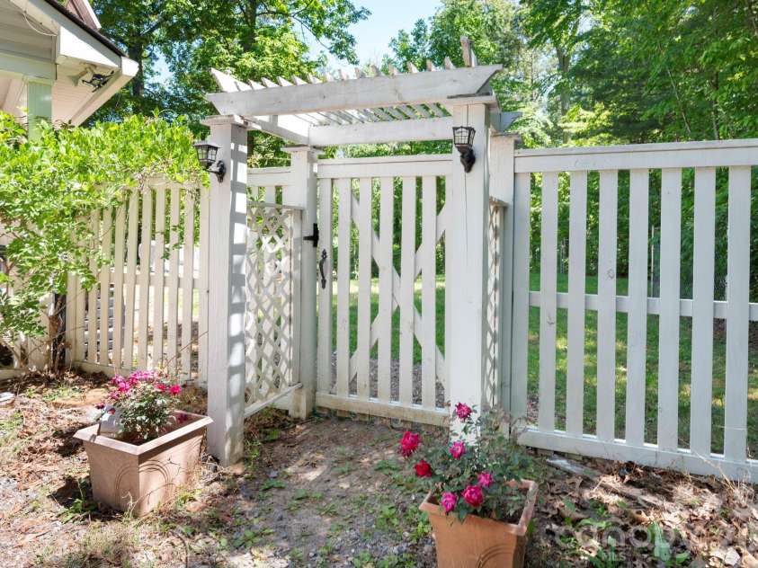 43 Charles Marlowe Drive, Fairview, NC 28730.  MLS# CAR4385183, YatesRealty ID 29070. Fenced backyard entrance...