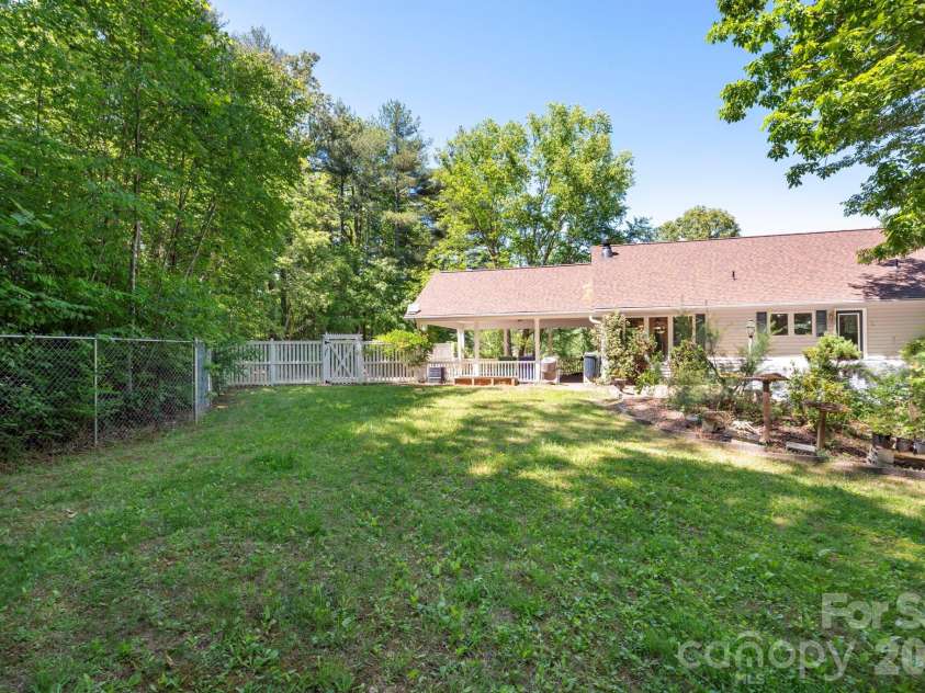 43 Charles Marlowe Drive, Fairview, NC 28730.  MLS# CAR4385183, YatesRealty ID 29070. Great space to personalize how you'd like...plant? Play? Pups?