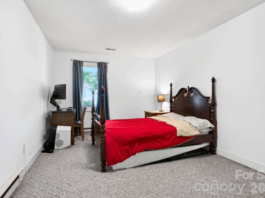 43 Charles Marlowe Drive, Fairview, NC 28730.  MLS# CAR4385183, YatesRealty ID 29070. Second bathroom lower level.
