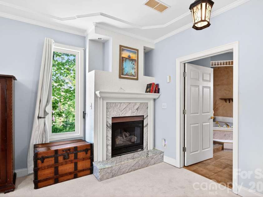 43 Charles Marlowe Drive, Fairview, NC 28730.  MLS# CAR4385183, YatesRealty ID 29070. Vented gas logs in the primary