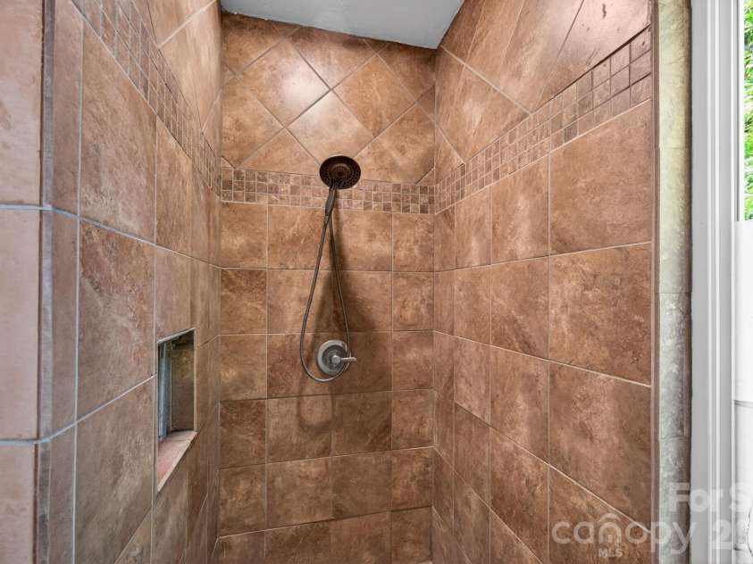 43 Charles Marlowe Drive, Fairview, NC 28730.  MLS# CAR4385183, YatesRealty ID 29070. Walk in shower