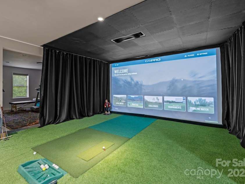 6008 Candlestick Lane, Lancaster, SC 29720.  MLS# CAR4256344, YatesRealty ID 29073. State-of-the-art golf simulator (included) Doubles as an immersive home theater!