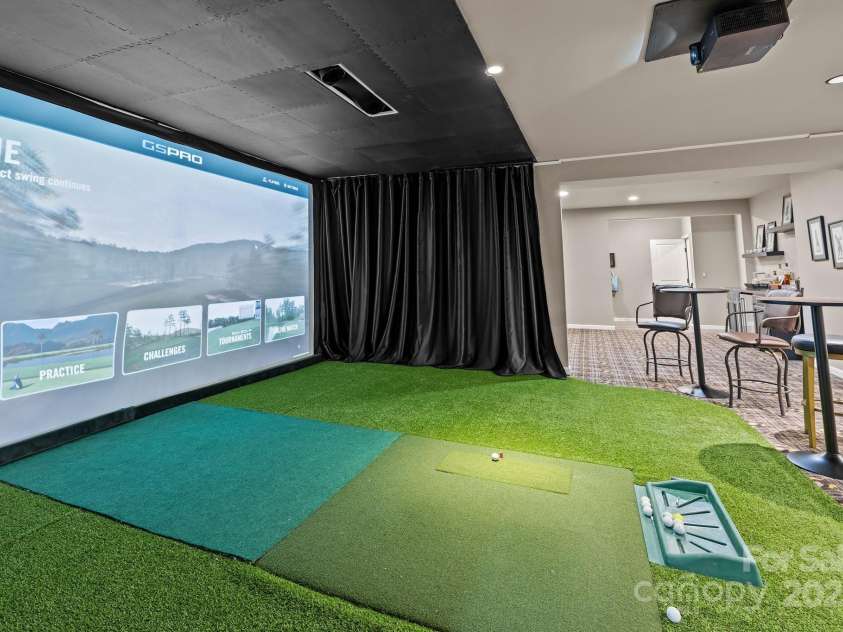 6008 Candlestick Lane, Lancaster, SC 29720.  MLS# CAR4256344, YatesRealty ID 29073. State-of-the-art golf simulator (included) Doubles as an immersive home theater!