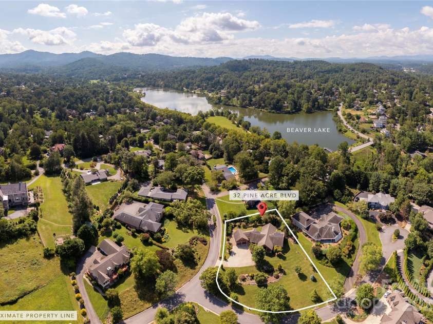 32 Pine Acre Boulevard, Asheville, NC 28804.  MLS# CAR4283589, YatesRealty ID 29077. Five minute walk to Beaver Lake from front door!