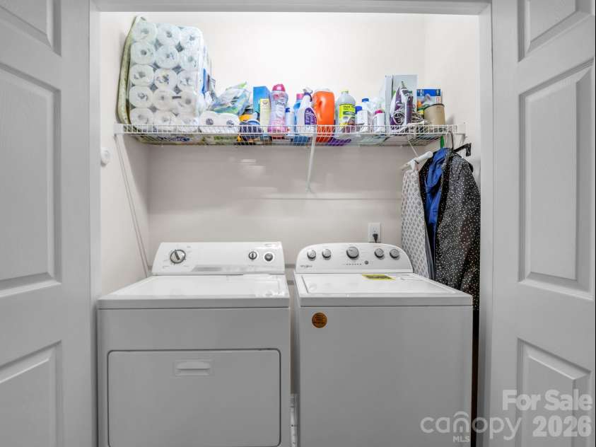 91 Brickton Village Circle, Fletcher, NC 28732.  MLS# CAR4370320, YatesRealty ID 29077. Laundry closet off dining area
