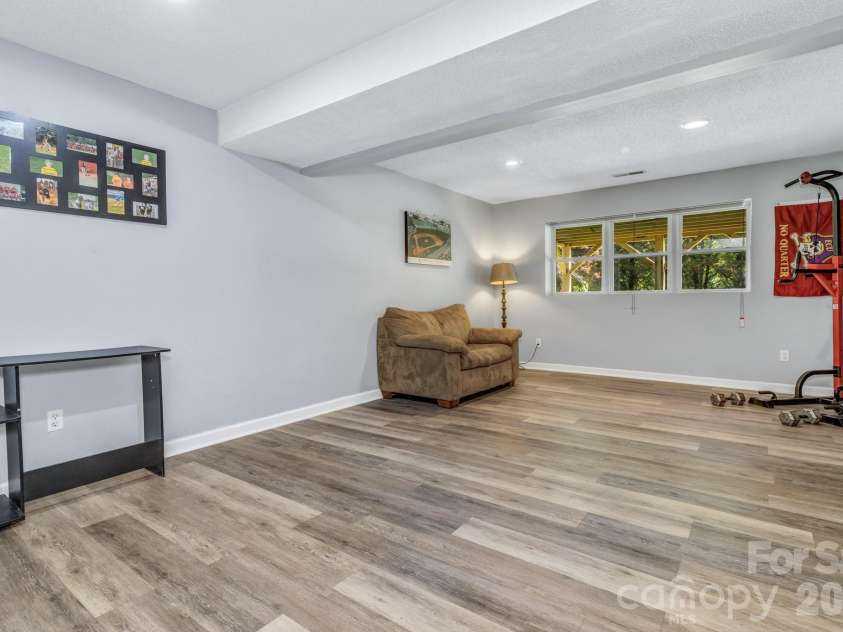 13 Spring Lake Drive, Fletcher, NC 28732.  MLS# CAR4371946, YatesRealty ID 29090. Large den/ flex space