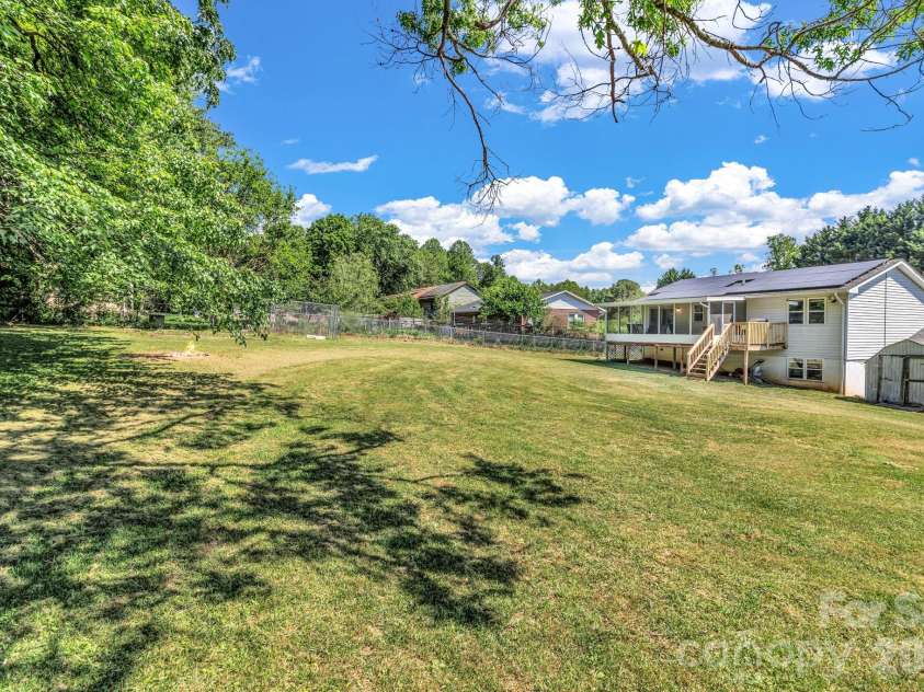 13 Spring Lake Drive, Fletcher, NC 28732.  MLS# CAR4371946, YatesRealty ID 29090. Large yard