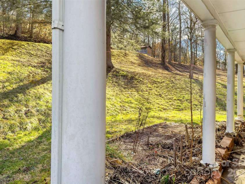 80 Robinson Holler Drive, Marion, NC 28752.  MLS# CAR4112689, YatesRealty ID 29090. Columns add an estate feell