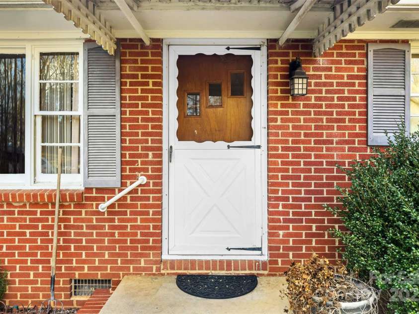 80 Robinson Holler Drive, Marion, NC 28752.  MLS# CAR4112689, YatesRealty ID 29090. Covered front entry.