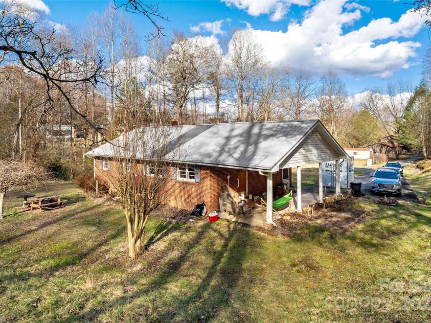 80 Robinson Holler Drive, Marion, NC 28752.  MLS# CAR4112689, YatesRealty ID 29090. Metal roof.