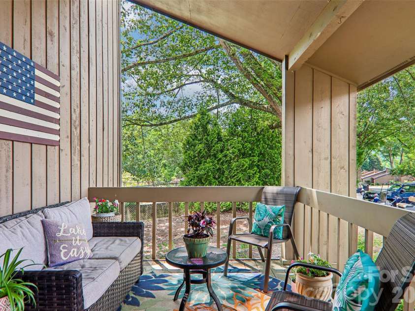 147 Lake Drive, Lake Lure, NC 28746.  MLS# CAR4385694, YatesRealty ID 29092. Extra large front porch