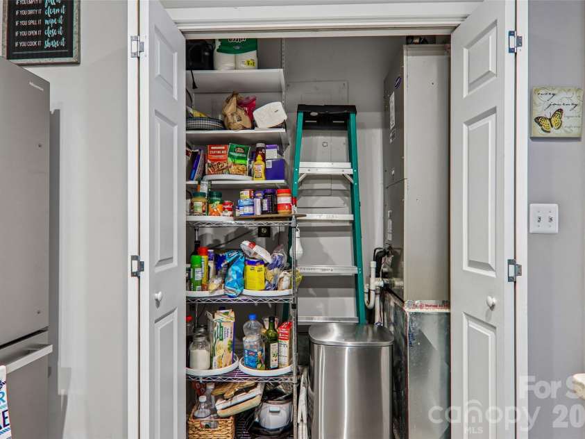 147 Lake Drive, Lake Lure, NC 28746.  MLS# CAR4385694, YatesRealty ID 29092. Extra storage in kitchen pantry