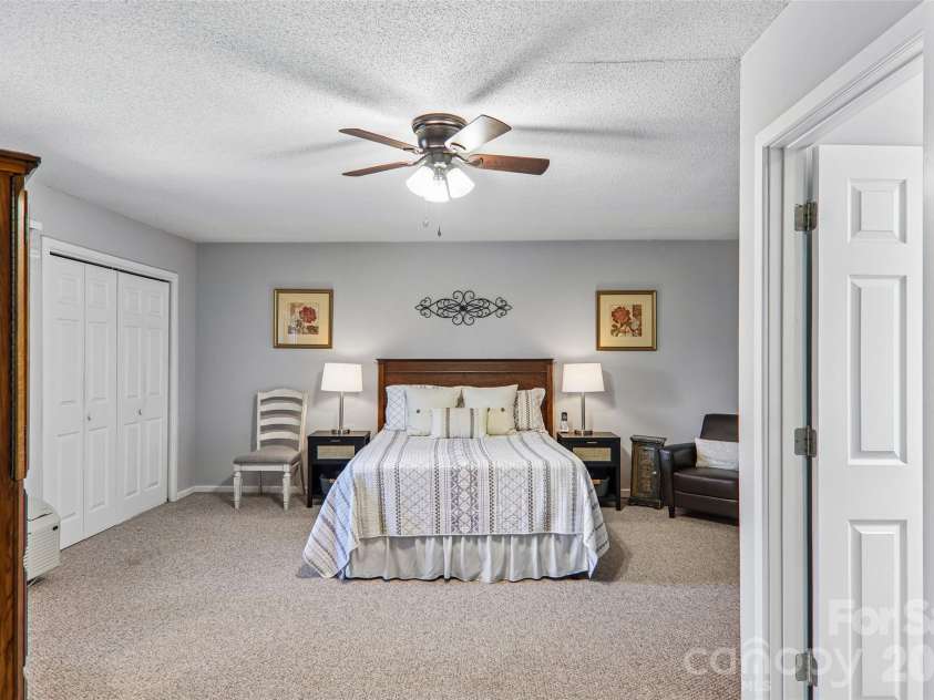 147 Lake Drive, Lake Lure, NC 28746.  MLS# CAR4385694, YatesRealty ID 29092. Large front bedroom with ensuite