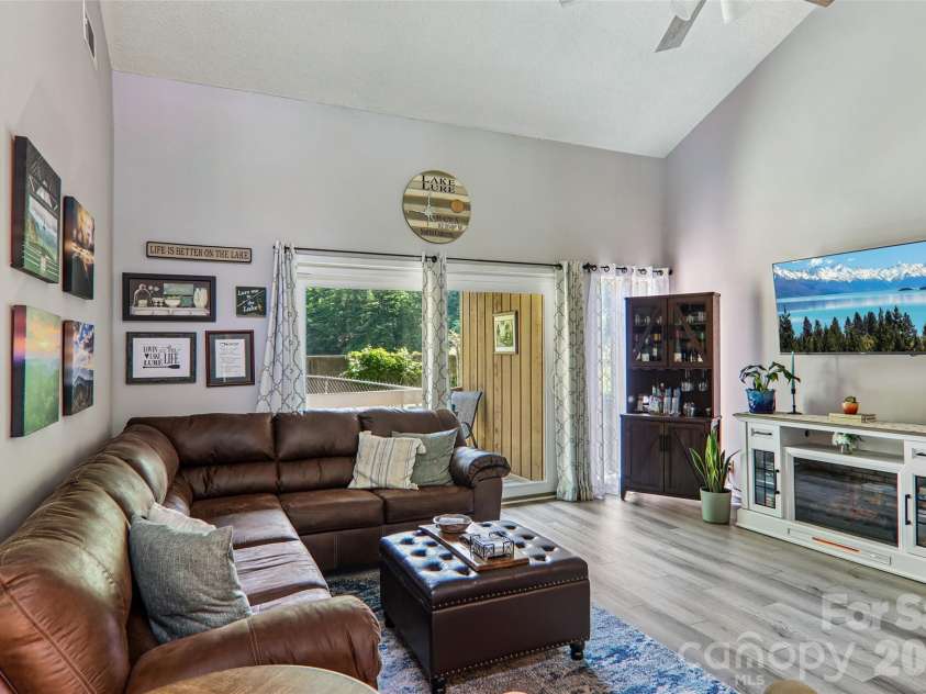 147 Lake Drive, Lake Lure, NC 28746.  MLS# CAR4385694, YatesRealty ID 29092. Large great room
