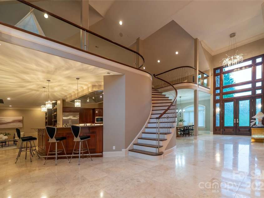 305 Mallard Drive, New London, NC 28127.  MLS# CAR4278141, YatesRealty ID 29094. Foyer to gourmet kitchen with bar