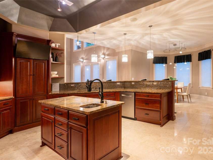 305 Mallard Drive, New London, NC 28127.  MLS# CAR4278141, YatesRealty ID 29094. Main level kitchen