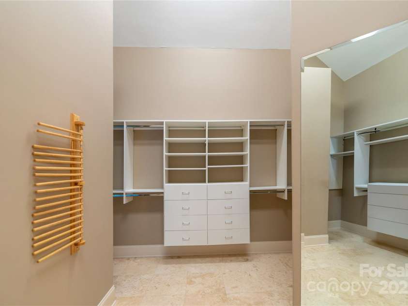 305 Mallard Drive, New London, NC 28127.  MLS# CAR4278141, YatesRealty ID 29094. Primary closet with dual sides