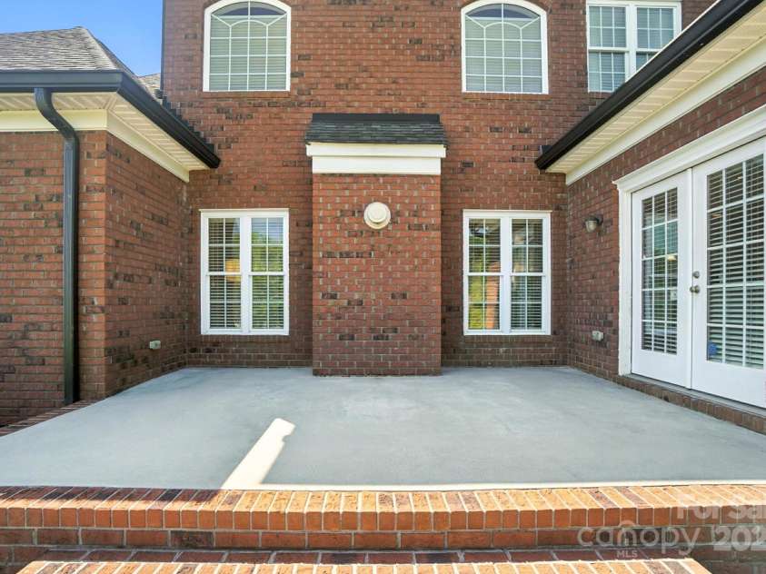 3864 French Fields Lane, Harrisburg, NC 28075.  MLS# CAR4280108, YatesRealty ID 29095. Back Patio