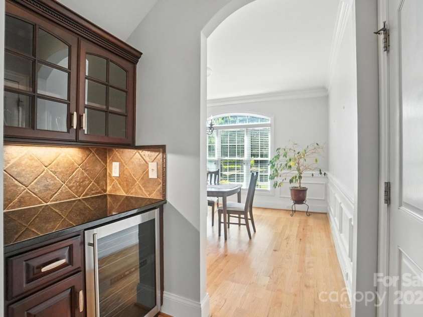 3864 French Fields Lane, Harrisburg, NC 28075.  MLS# CAR4280108, YatesRealty ID 29095. Butler's Pantry with Wine Fridge