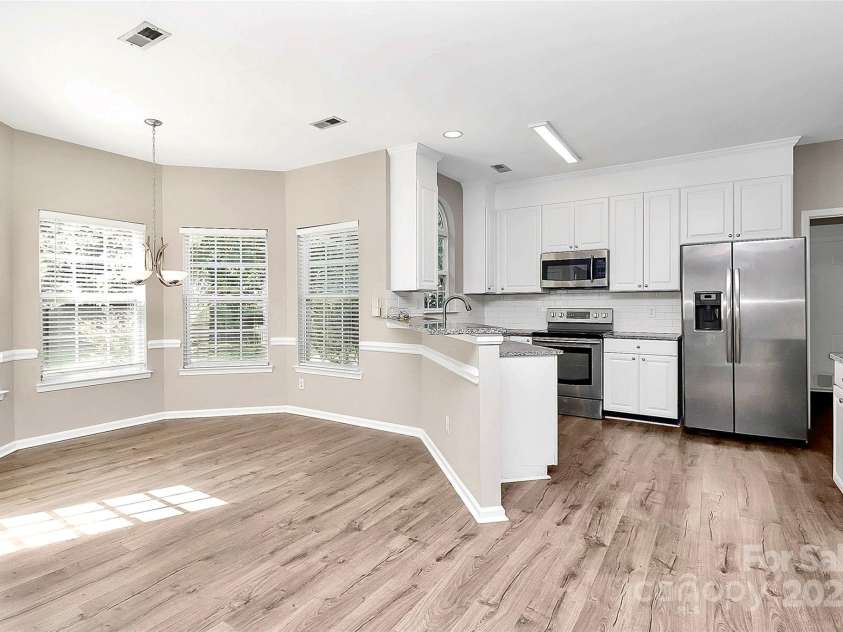 8808 Orchid Place, Charlotte, NC 28277.  MLS# CAR4284030, YatesRealty ID 29099. Kitchen and Breakfast Area