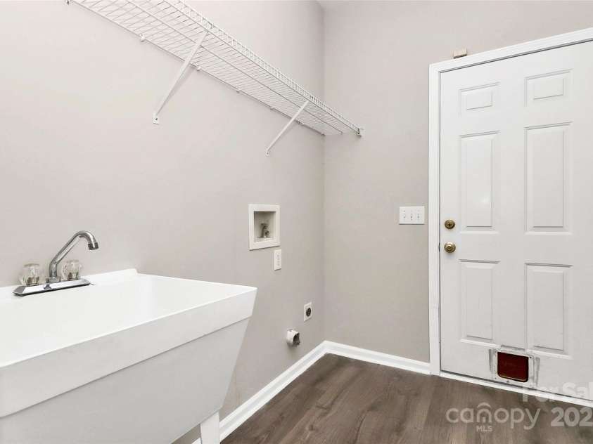 8808 Orchid Place, Charlotte, NC 28277.  MLS# CAR4284030, YatesRealty ID 29099. Main Level Laundry Room with Sink